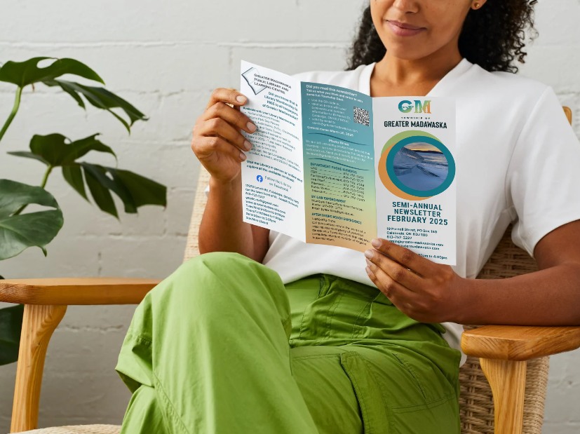 woman reading newsletter