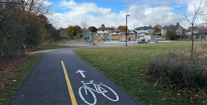 Park with playground and bike path