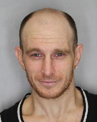 Charles LONGAPHIE wanted for Assault with a Weapon and Breach